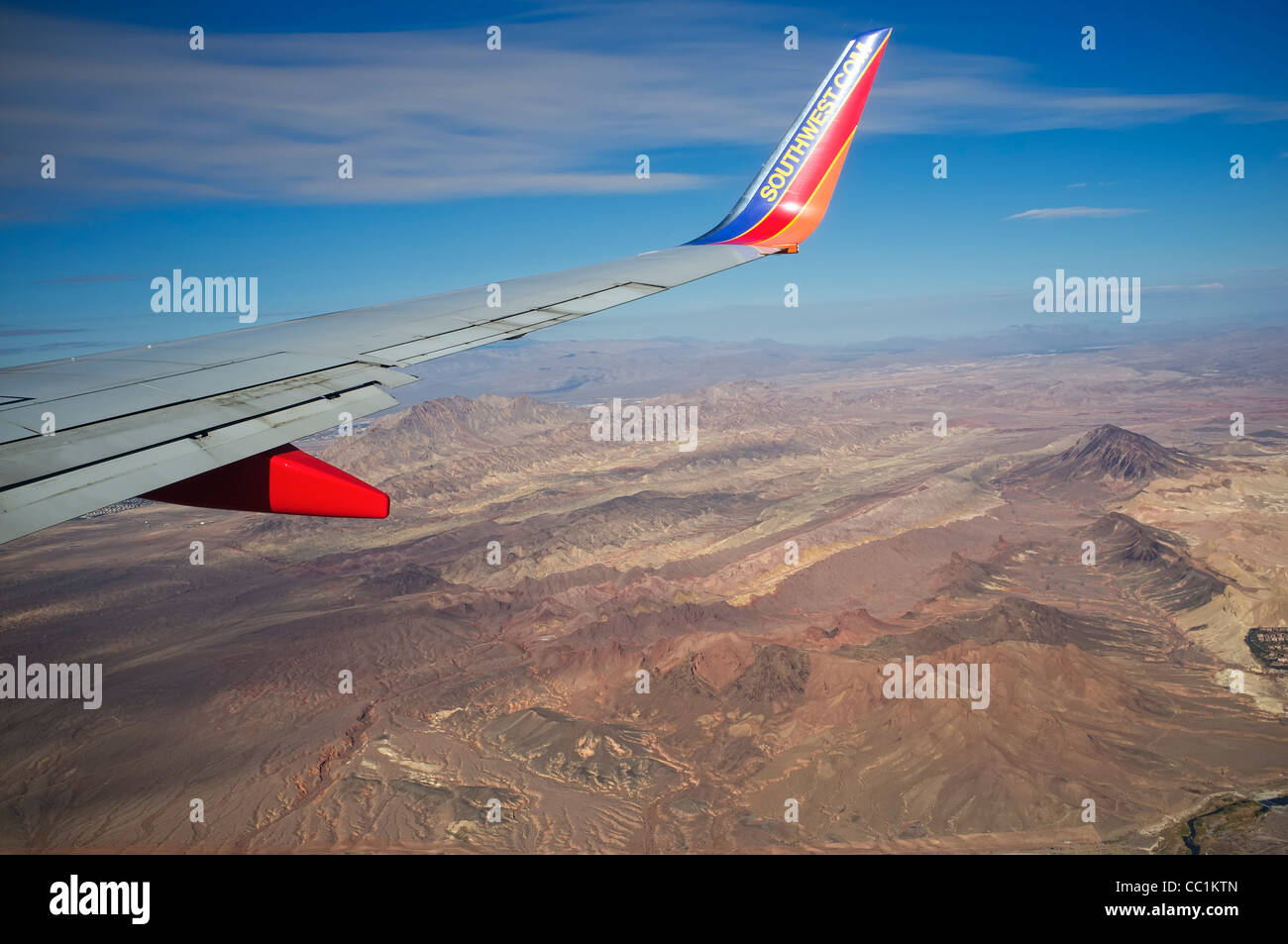 Wing of Southwest Airlines airplane flying over Grand Canyon area Stock