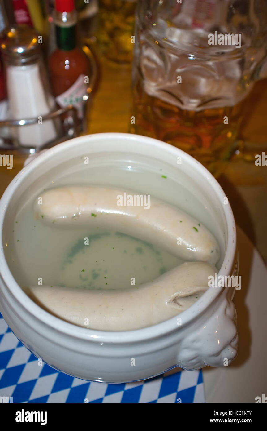 Bavarian Weisswurst - traditional dish served in hot water bowl Stock Photo