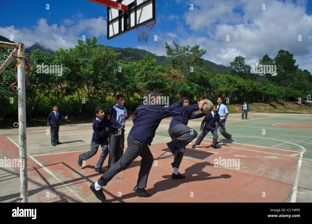 Young students from Honduras playing soccer at the break in a private school in Gracias Lempira. Stock Photo