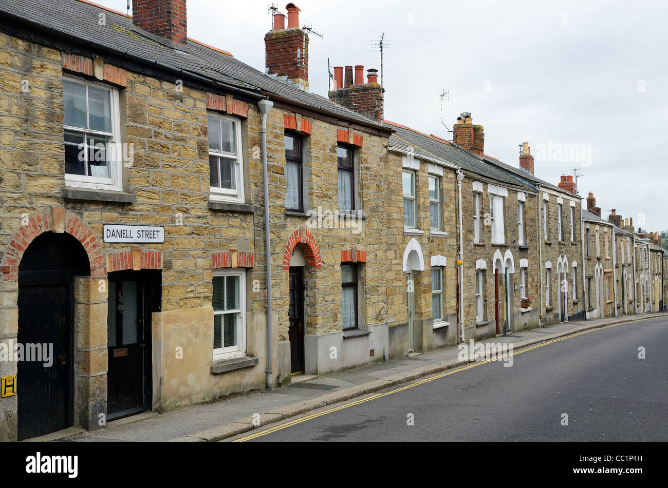 A row of old stone terraced cottages in Truro, Cornwall, UK Stock Photo
