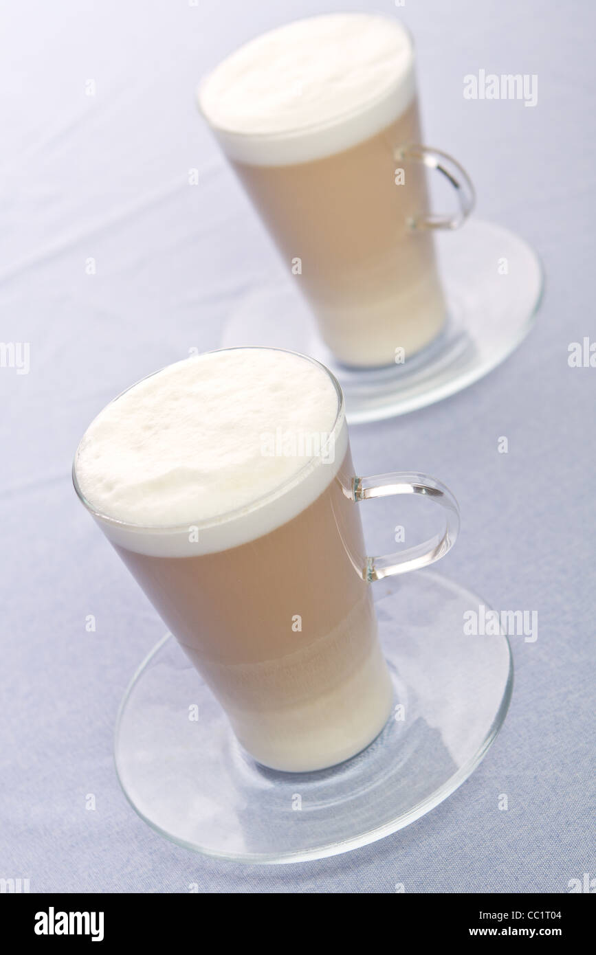 Two Cups of Latte on a table Stock Photo