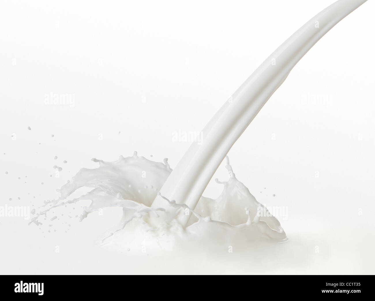 pouring milk or white liquid created splash Stock Photo