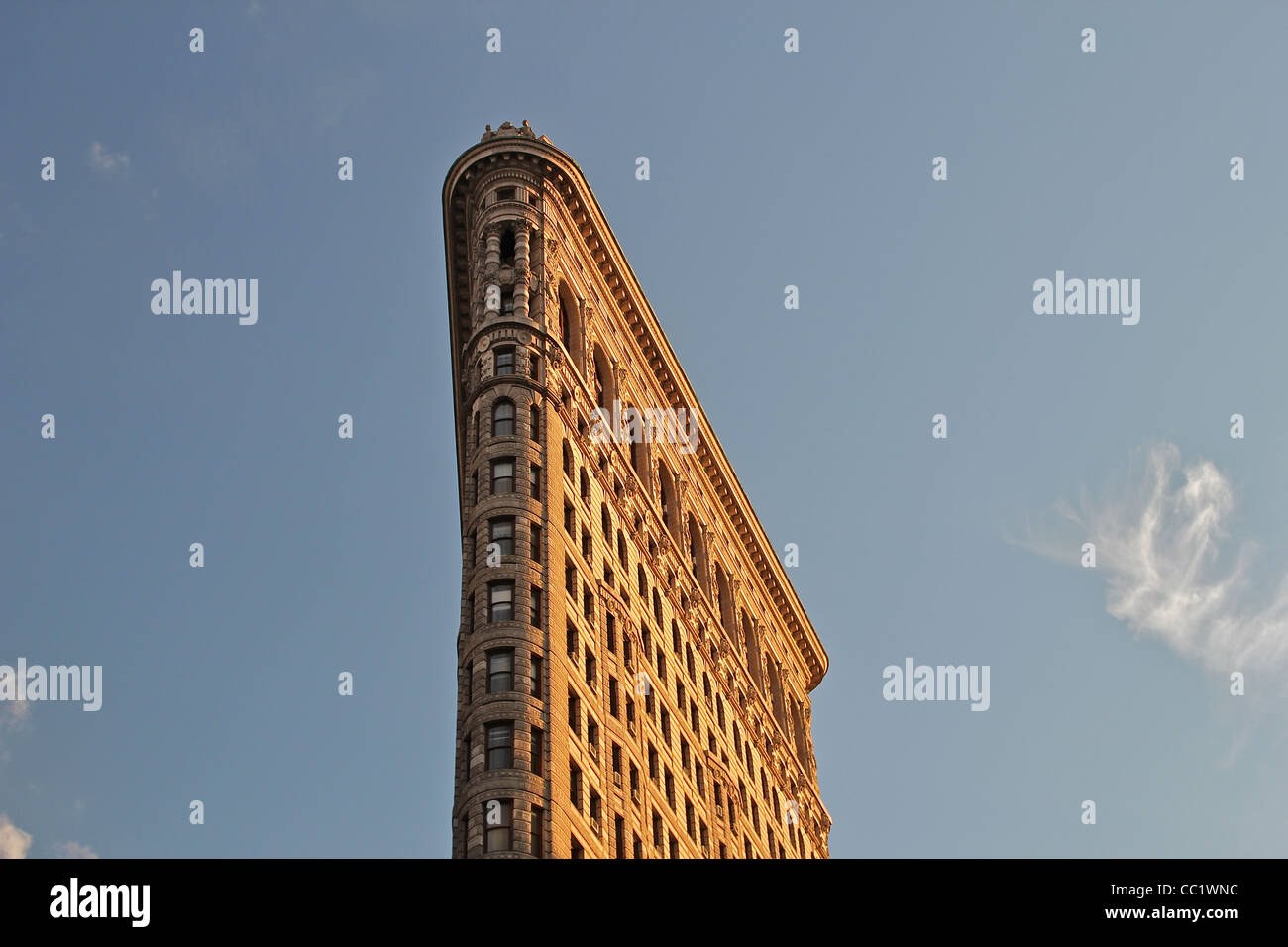 The Flatiron Building (built in 1902) in the late afternoon sunlight, Manhattan, New York City Stock Photo