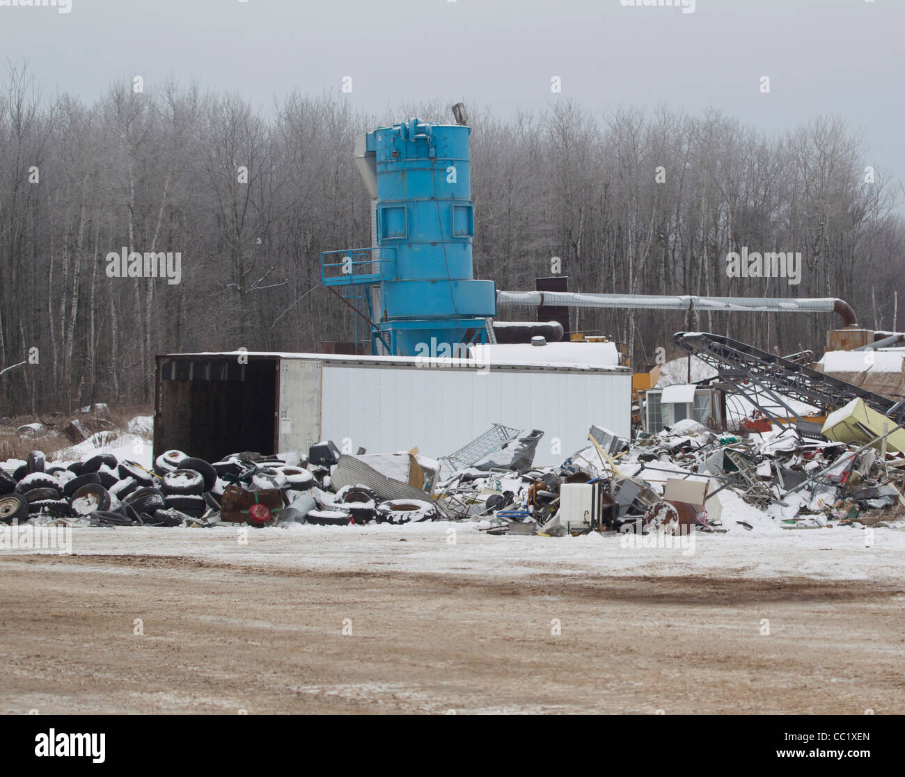 Blue metal recycling center machinery and scrap heaps Stock Photo Alamy