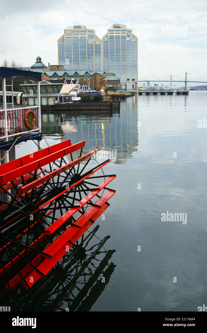 A paddle wheel on the Halifax Waterfront with Purdy's Wharf in the