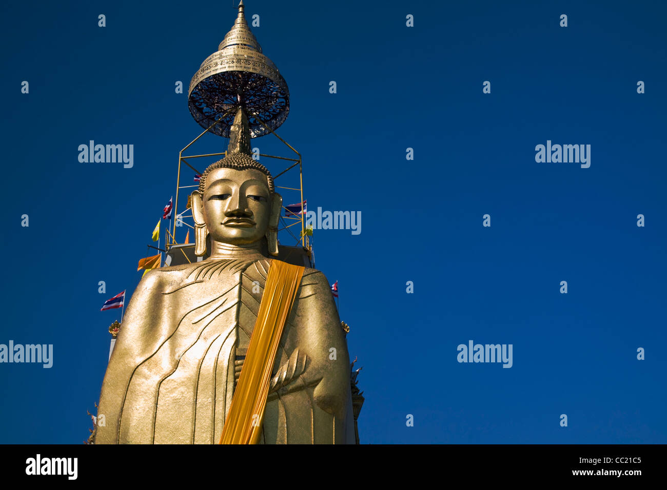 The standing Buddha at Wat Intharawihan, Bangkok, Thailand Stock Photo