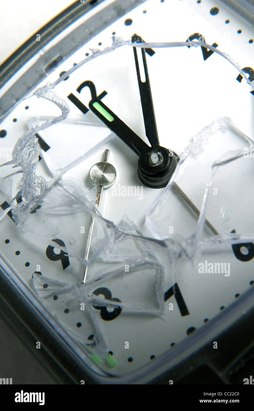 Broken clock - smashed alarm clock Stock Photo