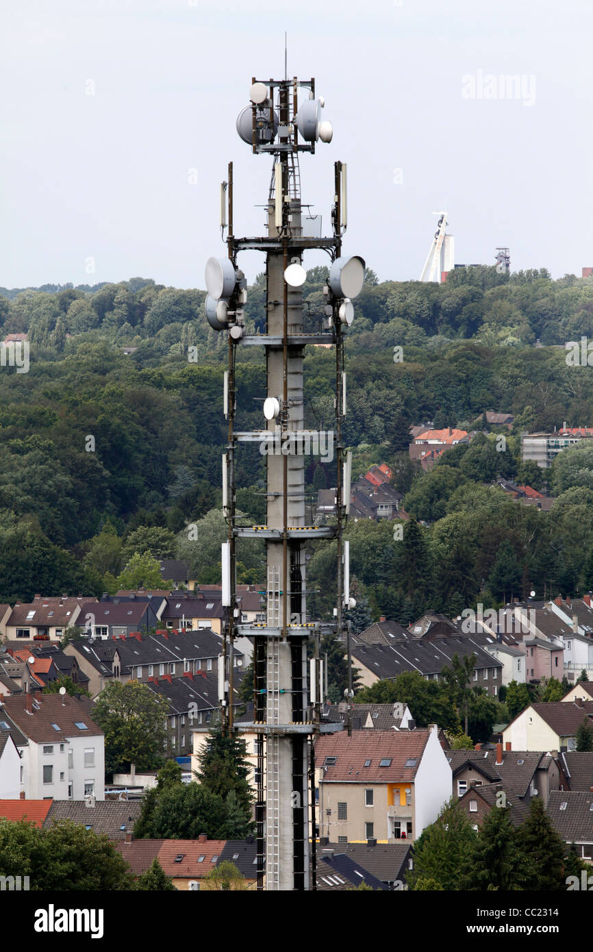 Antenna for mobile phone communication, in an urban housing area. Stock Photo