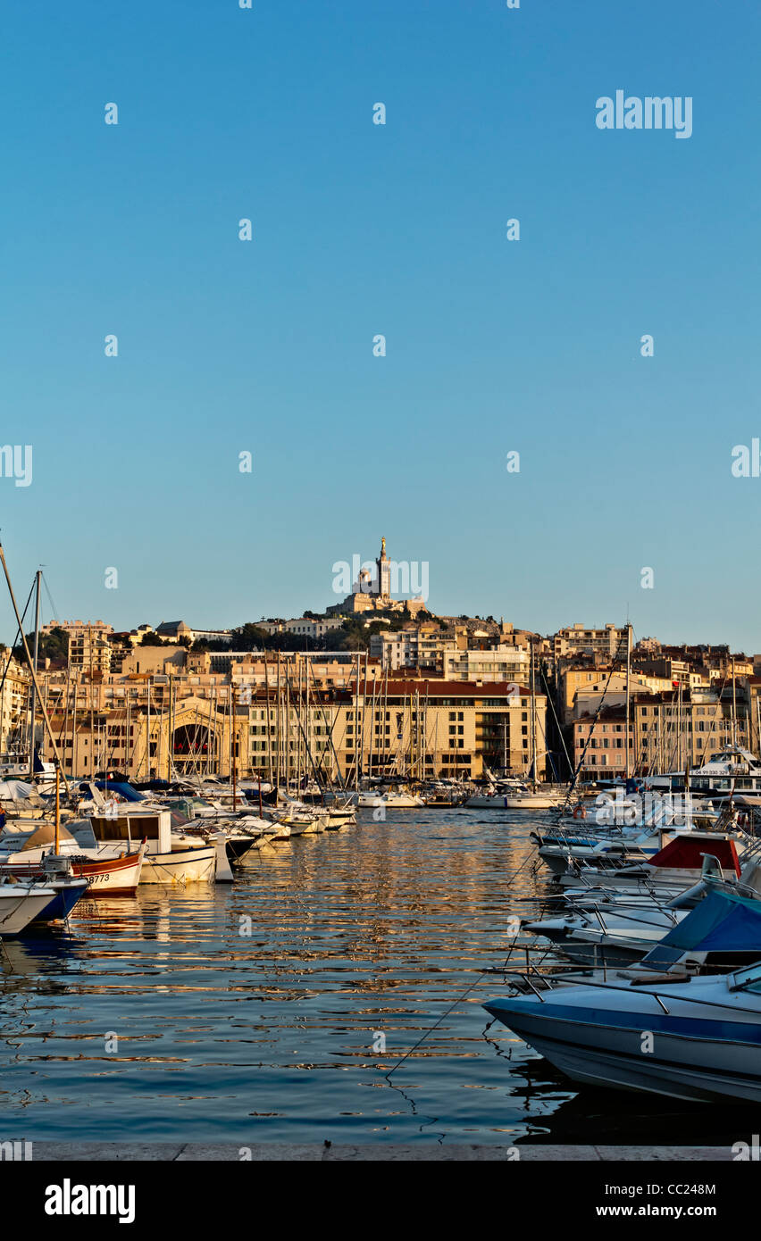 The Old Harbour, Vieux Port, with Basilica Notre Dame de la Garde in the distance, Marseille, Marseilles, Provence-Alpes-Côte d' Stock Photo