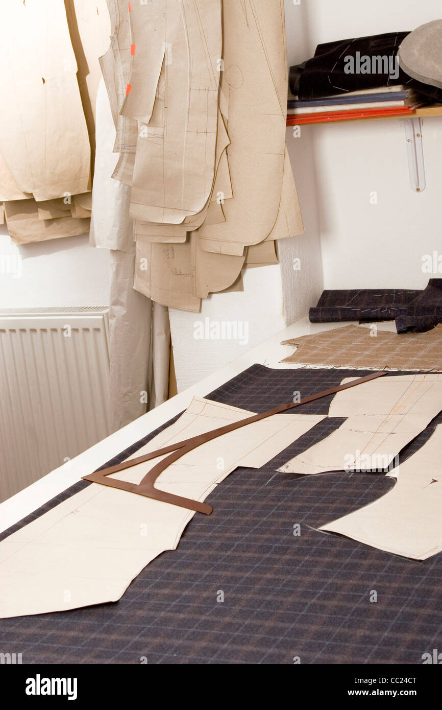 Tailor studio, fabric, paper sewing pattern, ready to make a suite