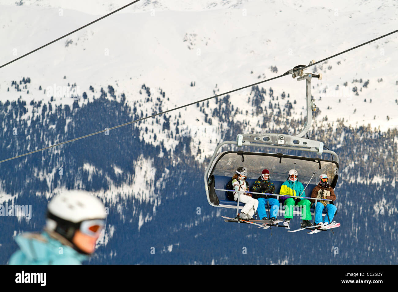 Skiers on chair lift in Hochzillertal ski region Kaltenbach Tyrol, Austria Stock Photo