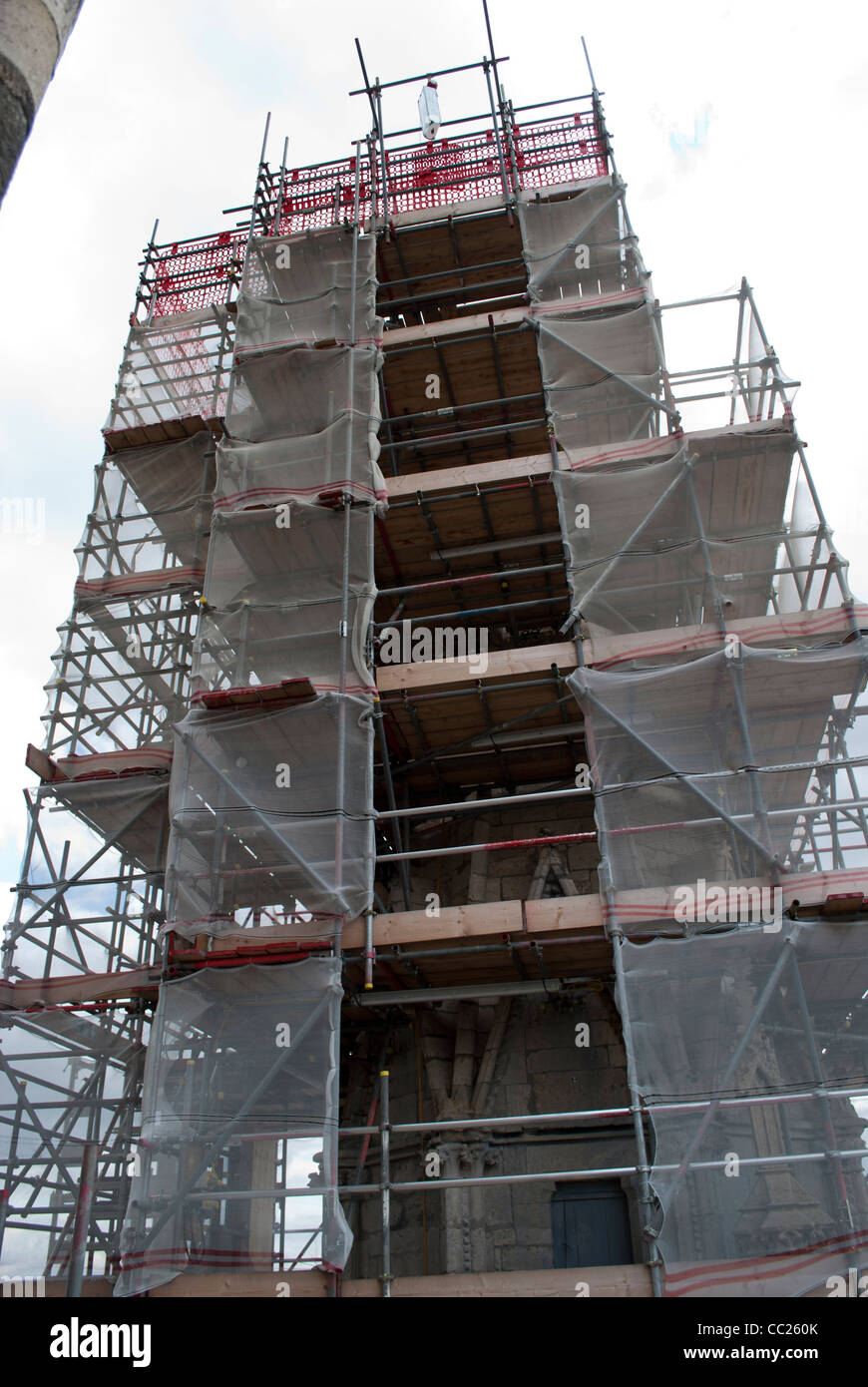 Scaffolding around a tower on the West Front from the roof of the nave of Lincoln Cathedral Stock Photo
