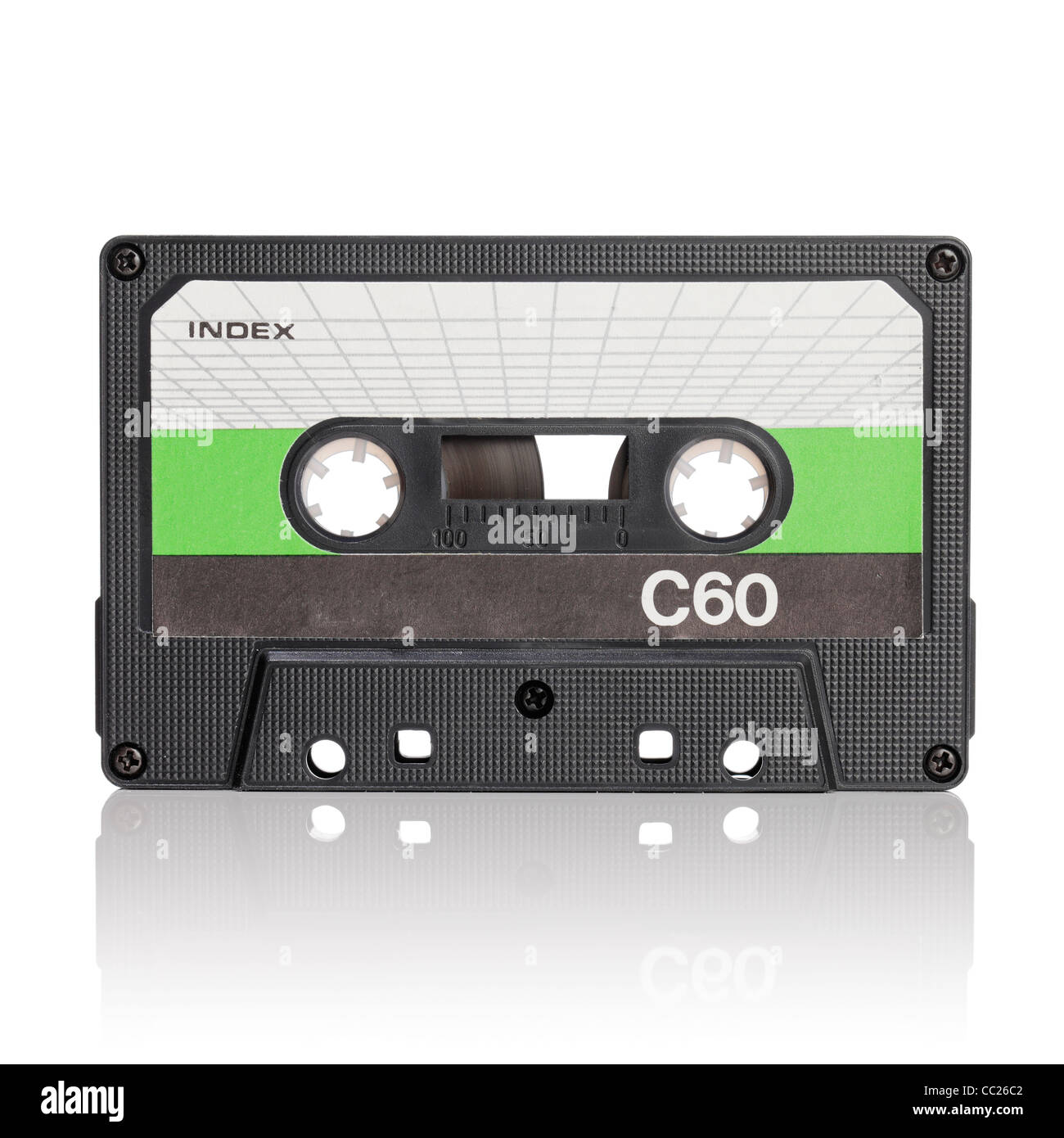 Vintage c-cassette audio tape on white with natural reflection Stock ...
