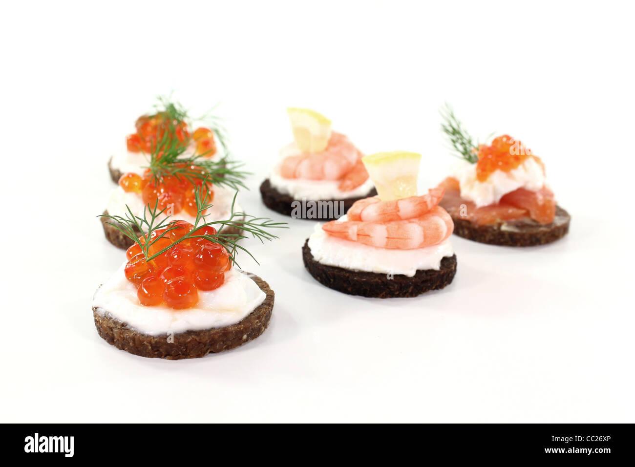 Pumpernickel bread with cream cheese, salmon, caviar and shrimp Stock Photo Alamy
