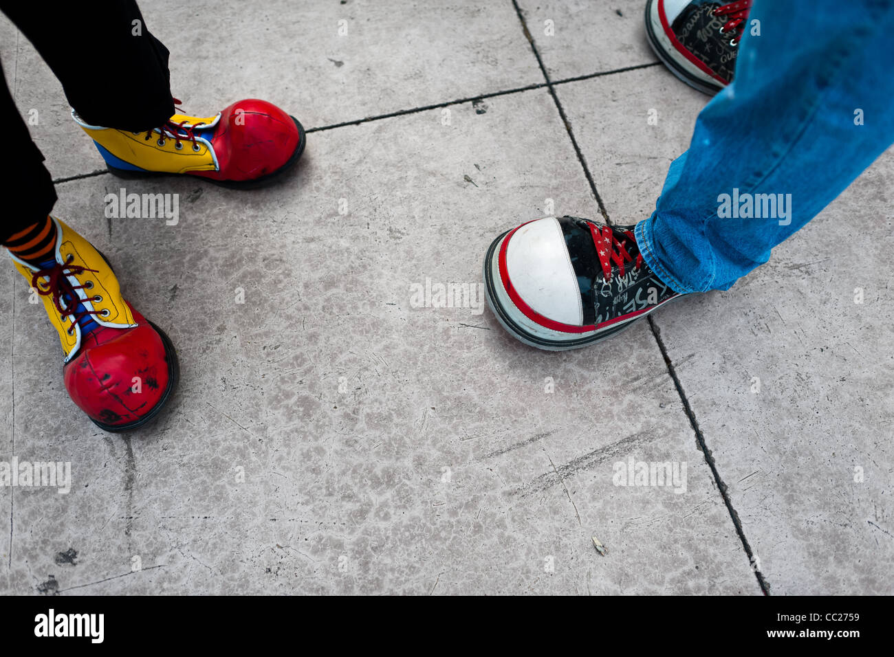 Clowns wear oversized colorful shoes during the Clown Congress in San