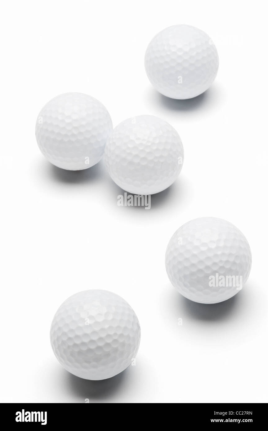 Five golf balls Stock Photo