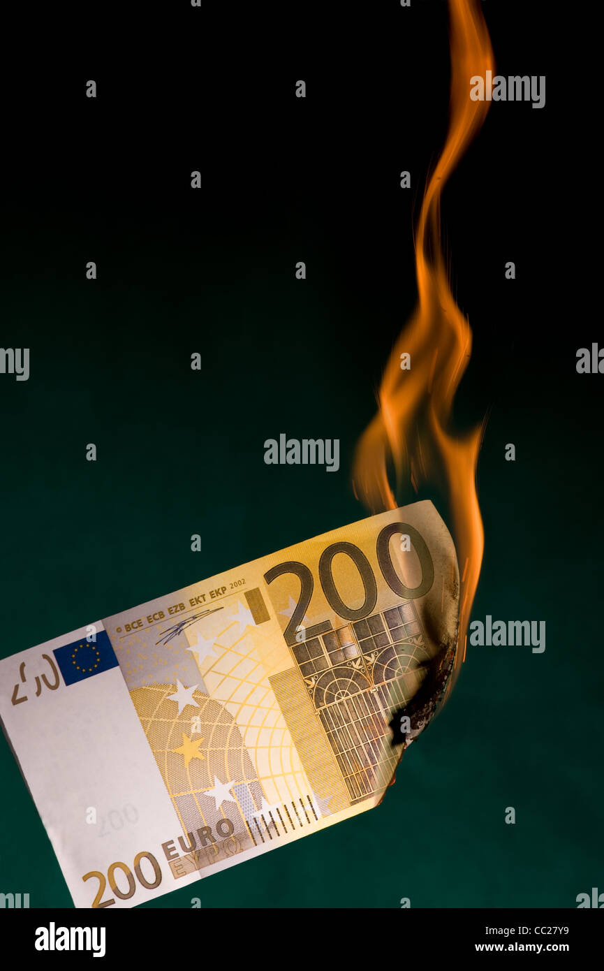 A 200 euro note on fire Stock Photo
