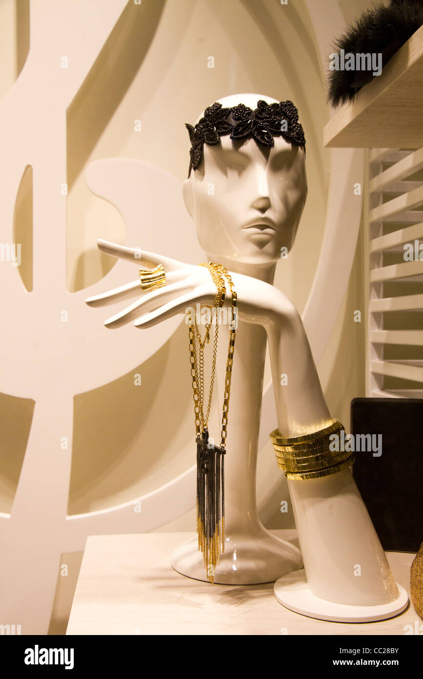 Manikin in window Female mannequin displayed in luxury store window