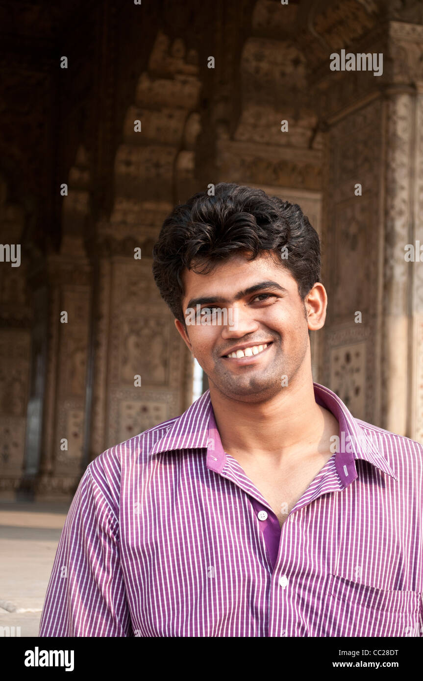 Young indian man smiling old delhi hires stock photography and images