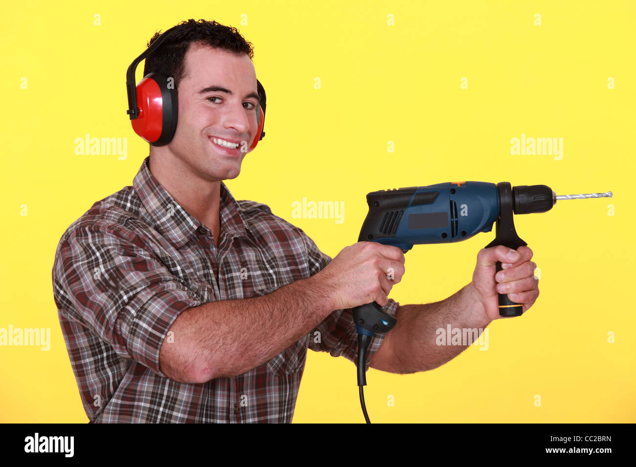 Man with a power drill Stock Photo Alamy