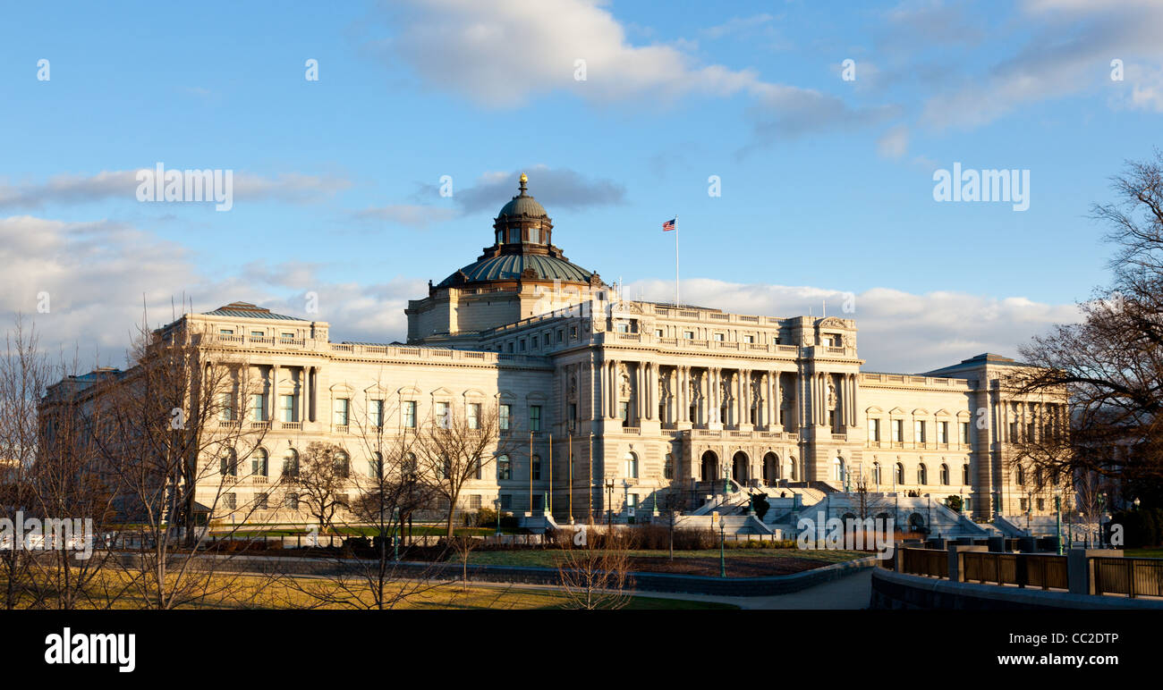 The setting sun lights up the US Library of Congress with warm light in late afternoon Stock Photo