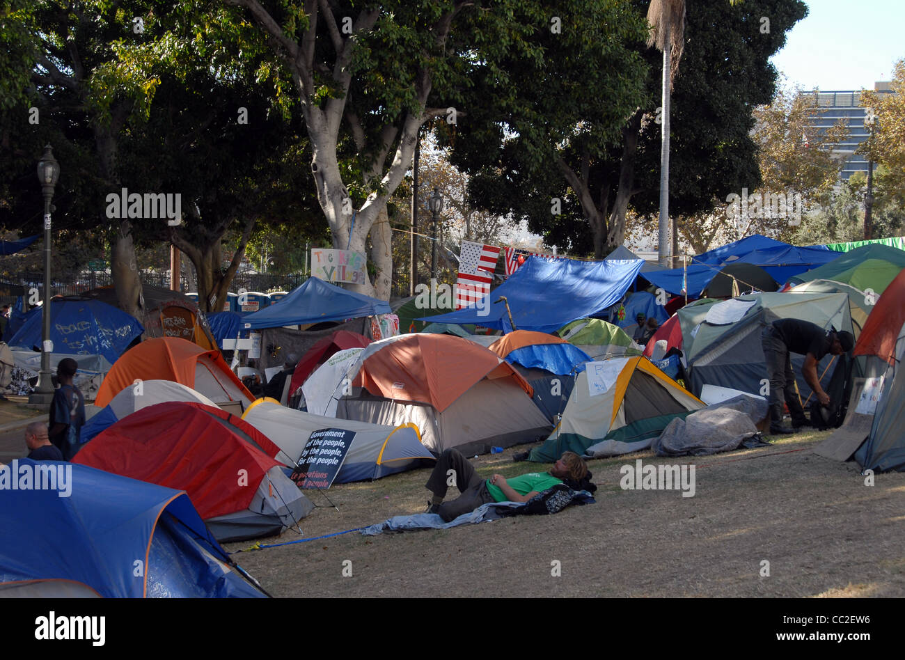 a-young-man-sleeps-near-his-tent-during-occupy-los-angeles-on-november-CC2EW6.jpg