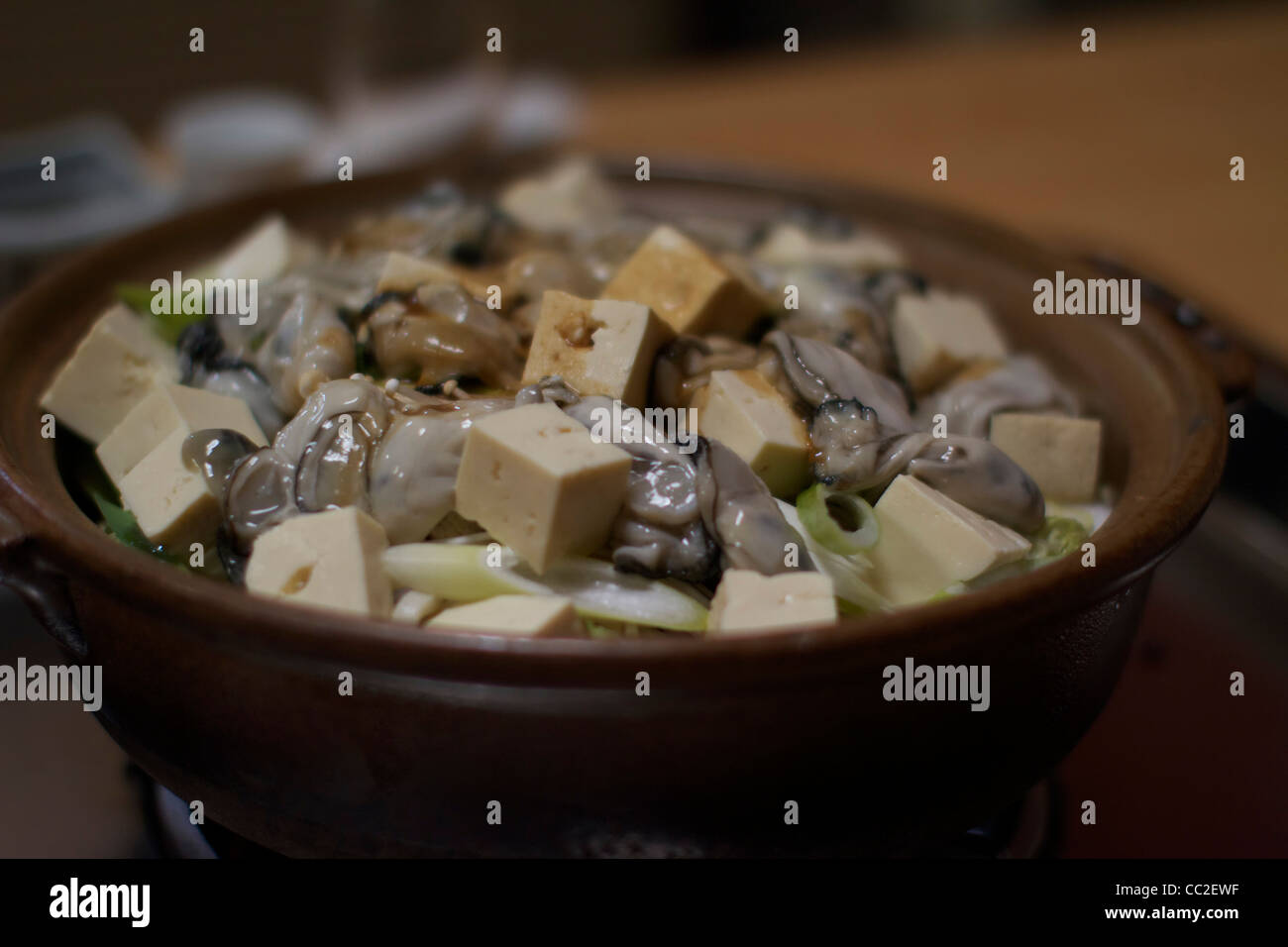 Japanese stew with oysters and tofu Stock Photo Alamy
