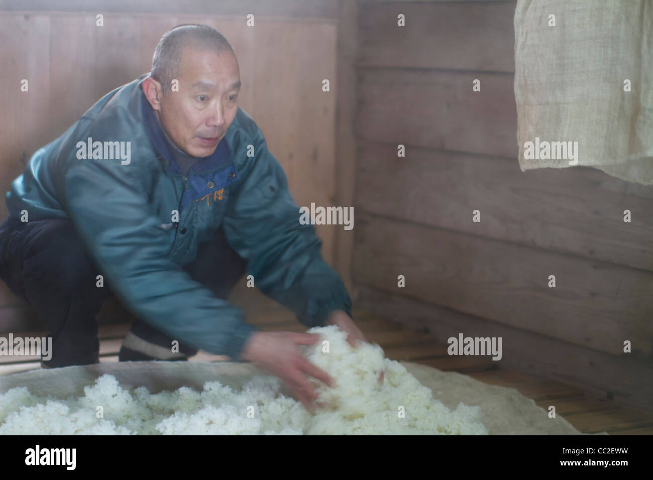 working with hot rice for make sake Stock Photo Alamy