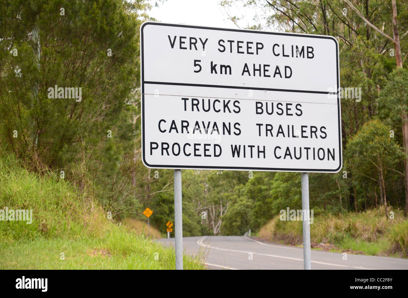Warning road sign Steep hill ahead Stock Photo - Alamy