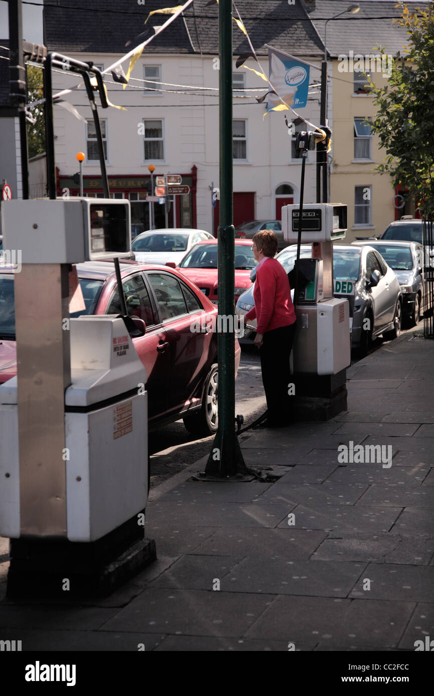 Old style streetside fuel pumps, still in use 2011, Thomastown, Kilkenny, Ireland Stock Photo