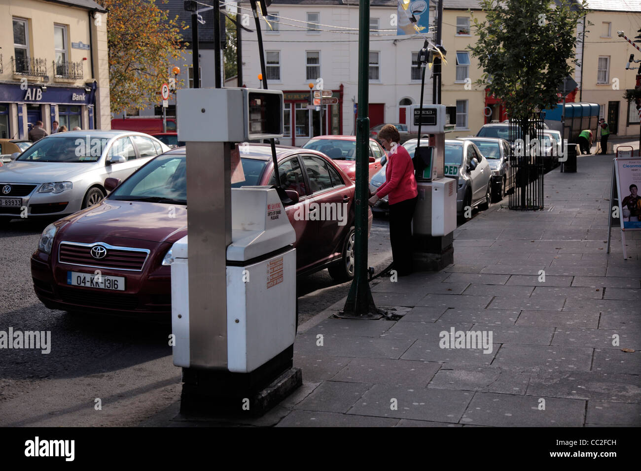 Old style streetside fuel pumps, still in use 2011, Thomastown, Kilkenny, Ireland Stock Photo