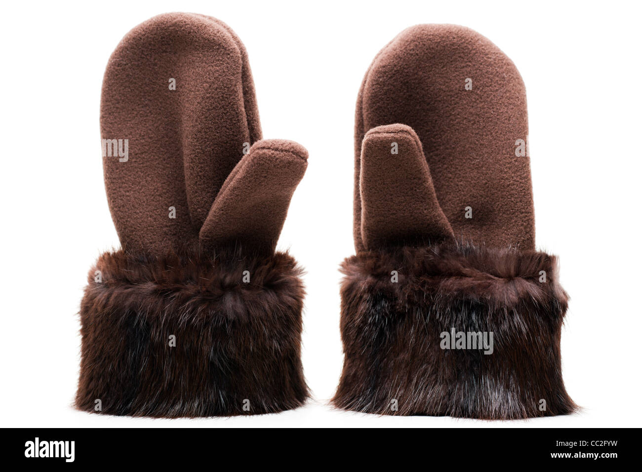 pair ladies brown fleece and fur cuffed mittens Stock Photo