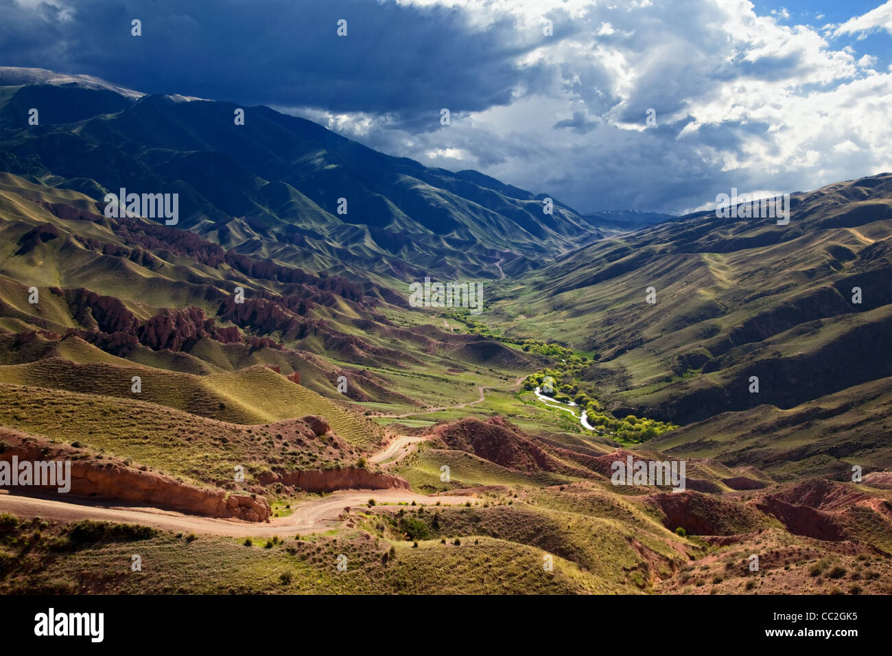 Oasis in desert mountains on Assy plateau, Tien-Shan mountain, Kazakstan Stock Photo