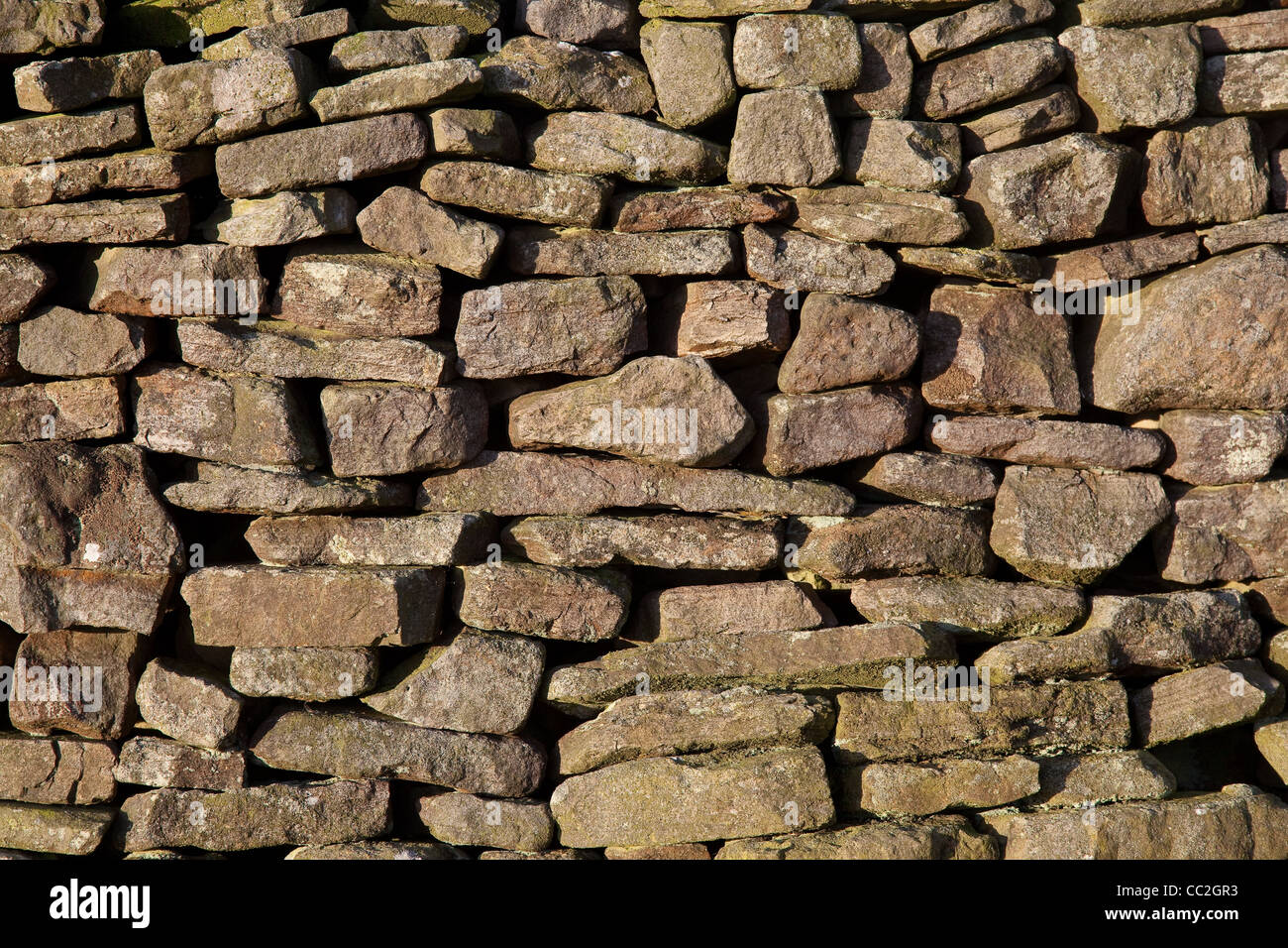 Dry Stone Wall or Dykes  Stone Construction and placings  Close-up Stock Photo