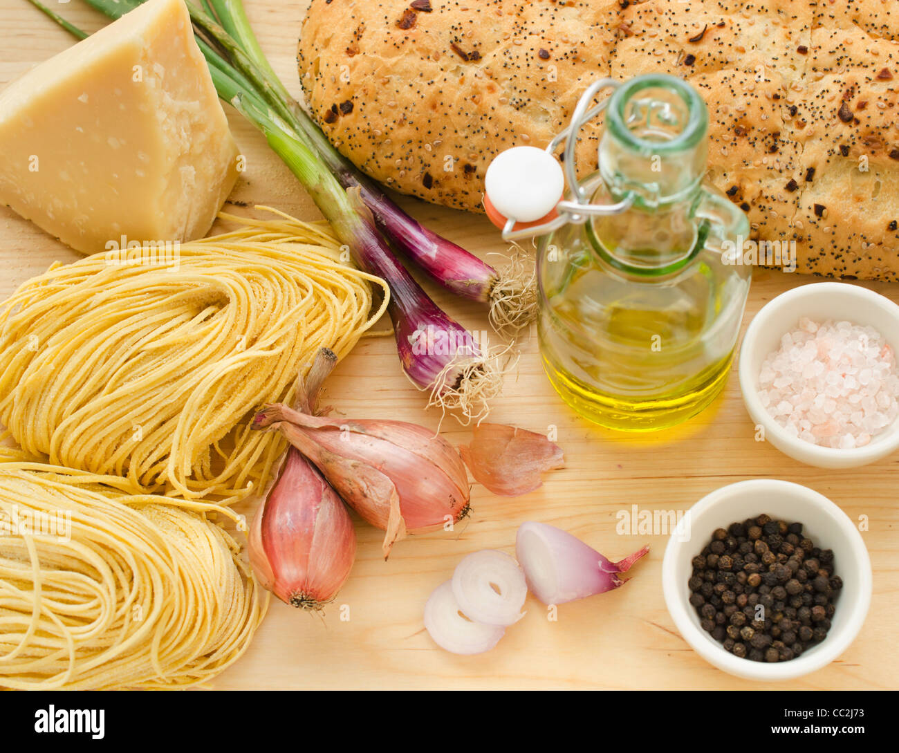 Pasta, cheese, garlic and olive oil, studio shot Stock Photo