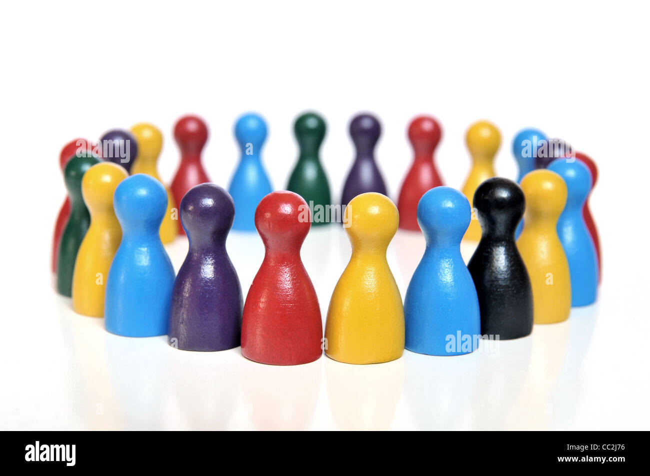 Discussion forum of multicolored toy figures on white background Stock Photo