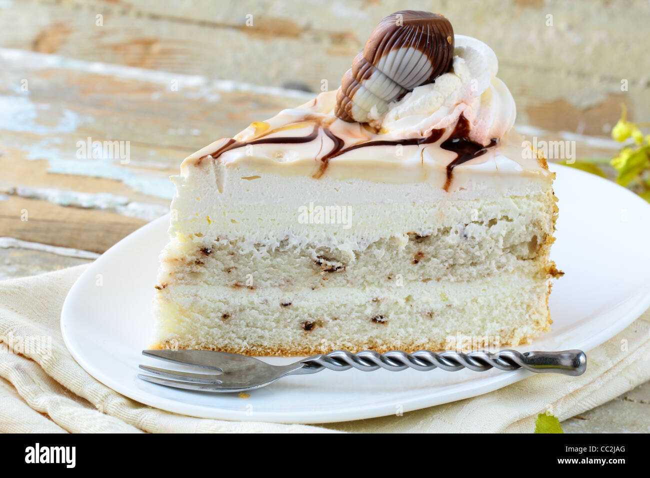 White Cream Icing Cake with Chocolate Stock Photo