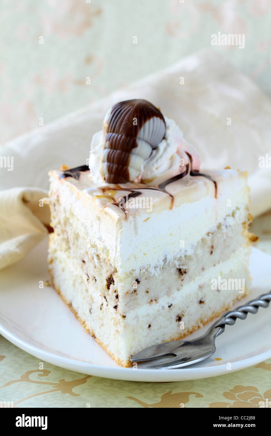 White Cream Icing Cake with Chocolate Stock Photo