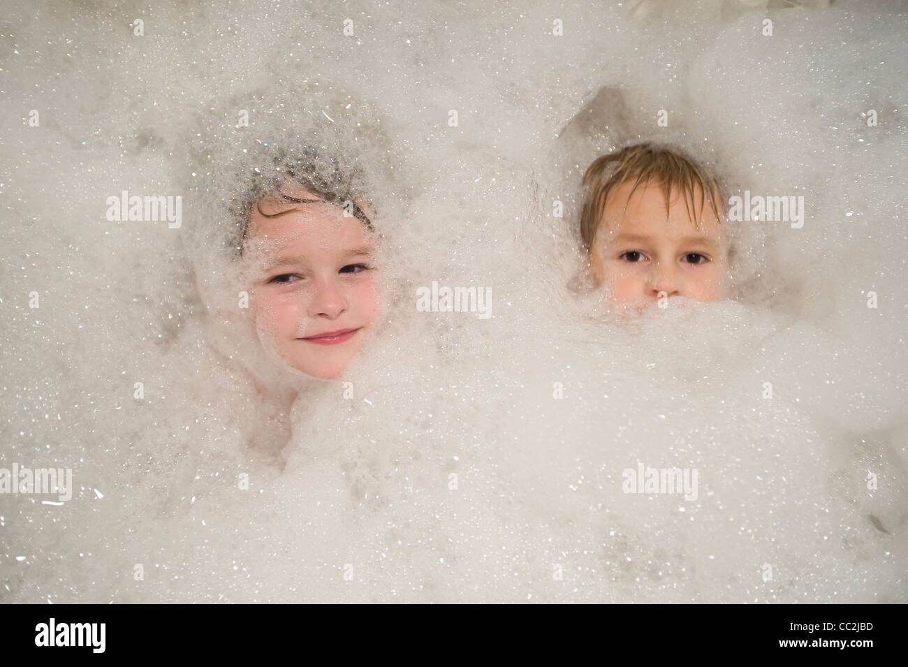 boys in foam bath Stock Photo
