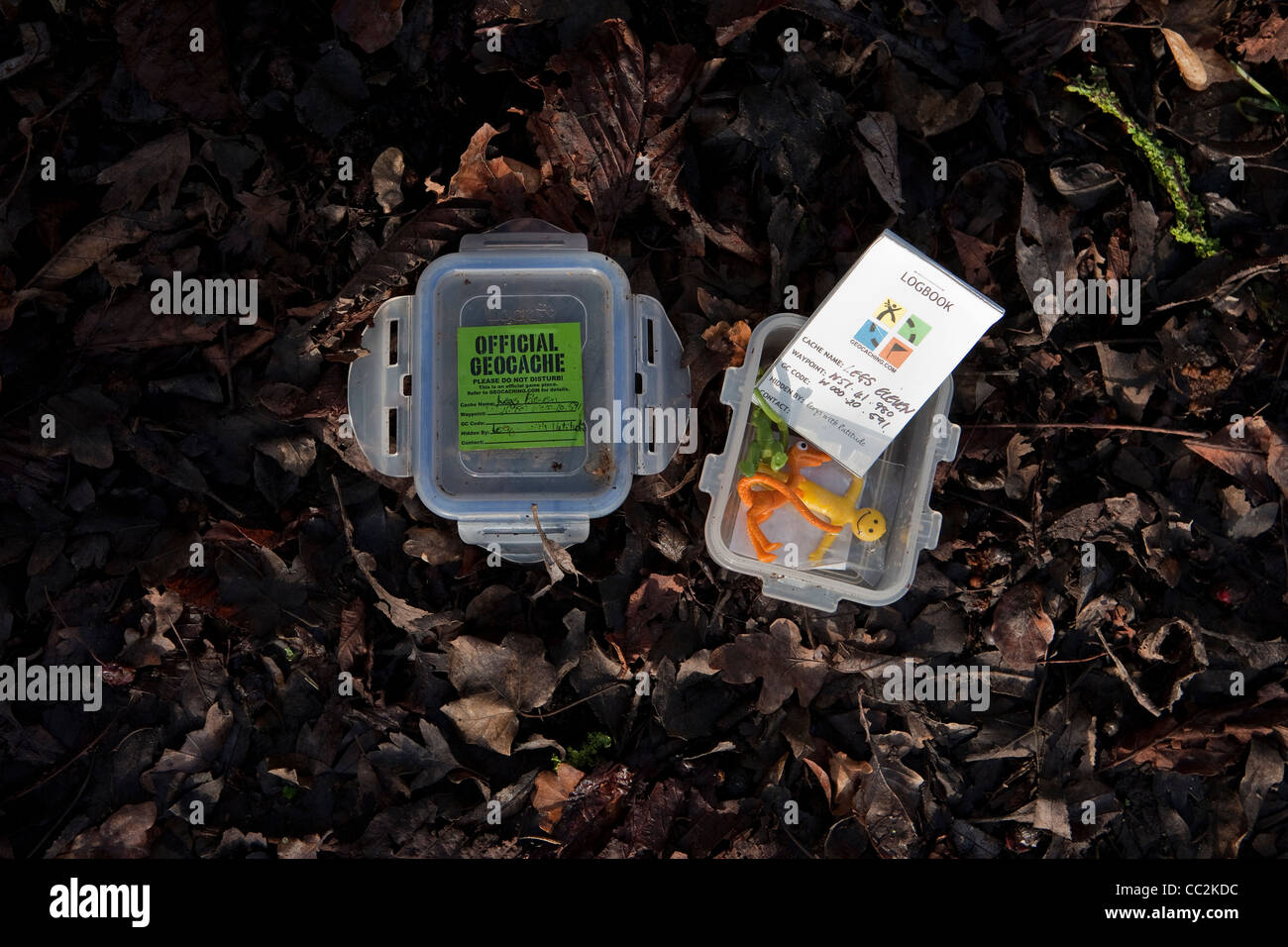 An open geocache box showing contents Stock Photo Alamy