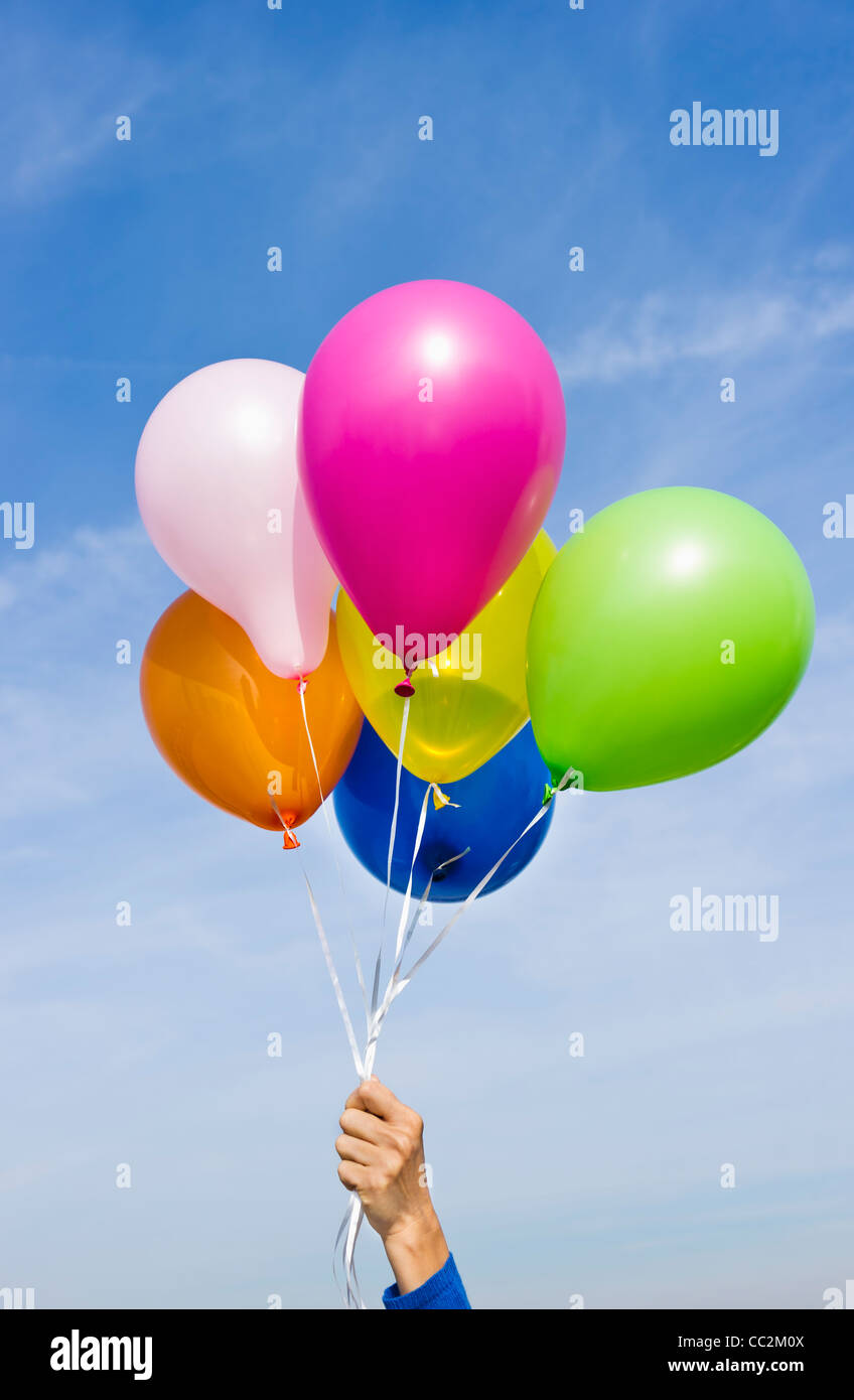 Hand holding balloons hires stock photography and images Alamy