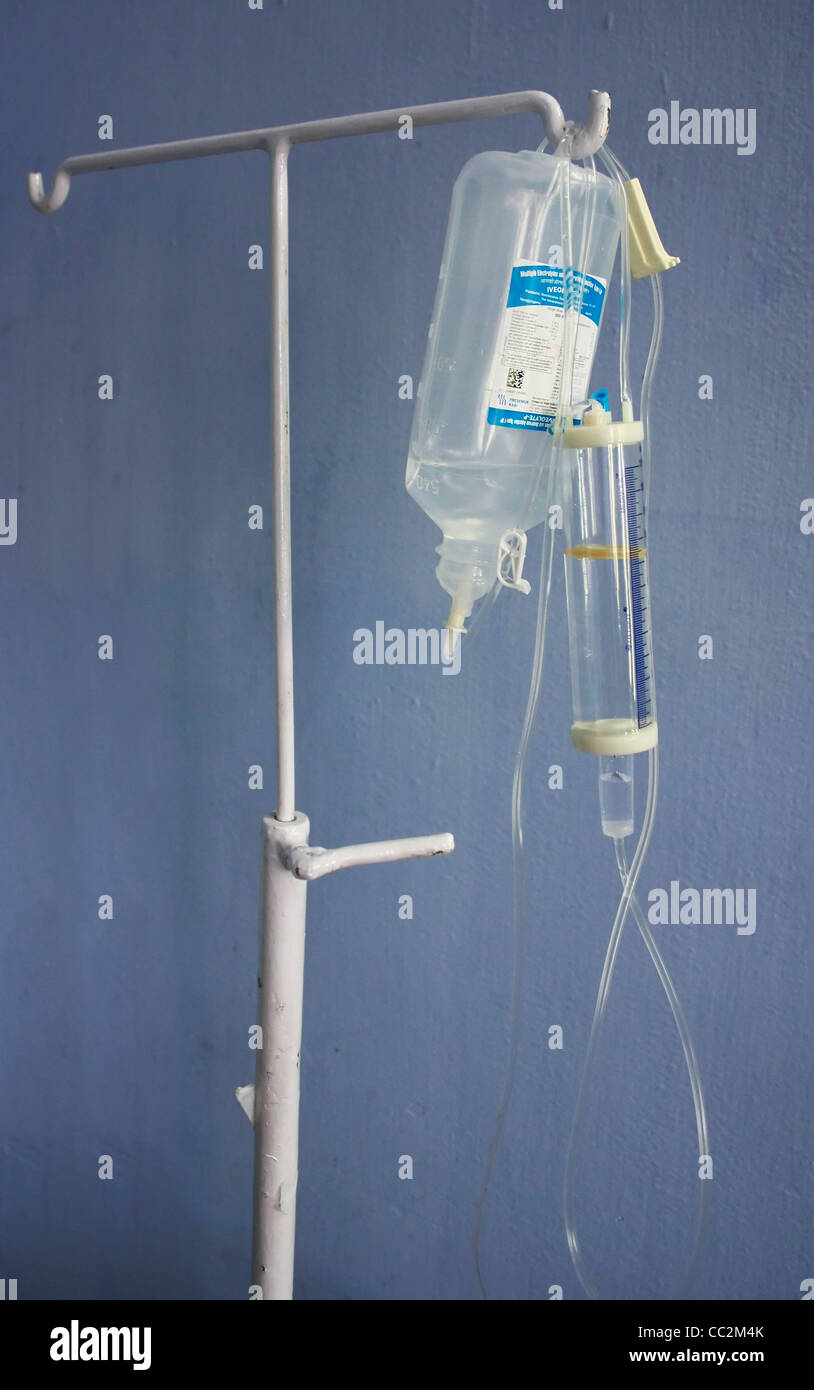 Bottle of glucose trip held in a stand in hospital Stock Photo - Alamy