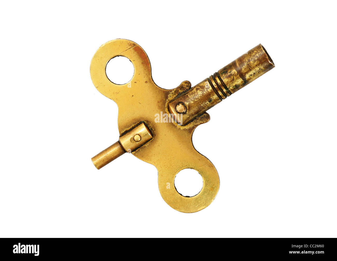 antique brass clock winding key isolated on white background Stock Photo