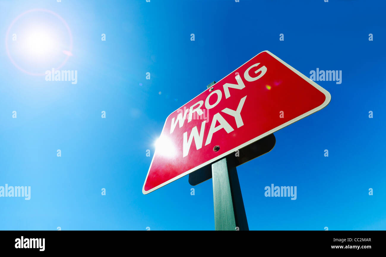 Low angle view of 'wrong way' sign Stock Photo
