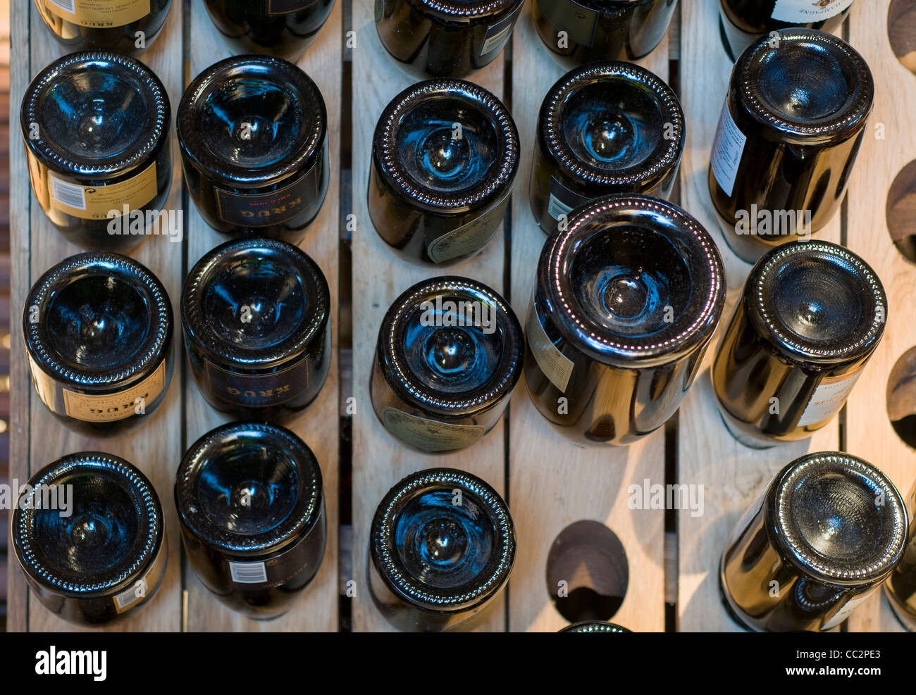 Sparkling Wine and Champagne Bottles Stored in Riddling Rack at Italian Enoteca Stock Photo Alamy