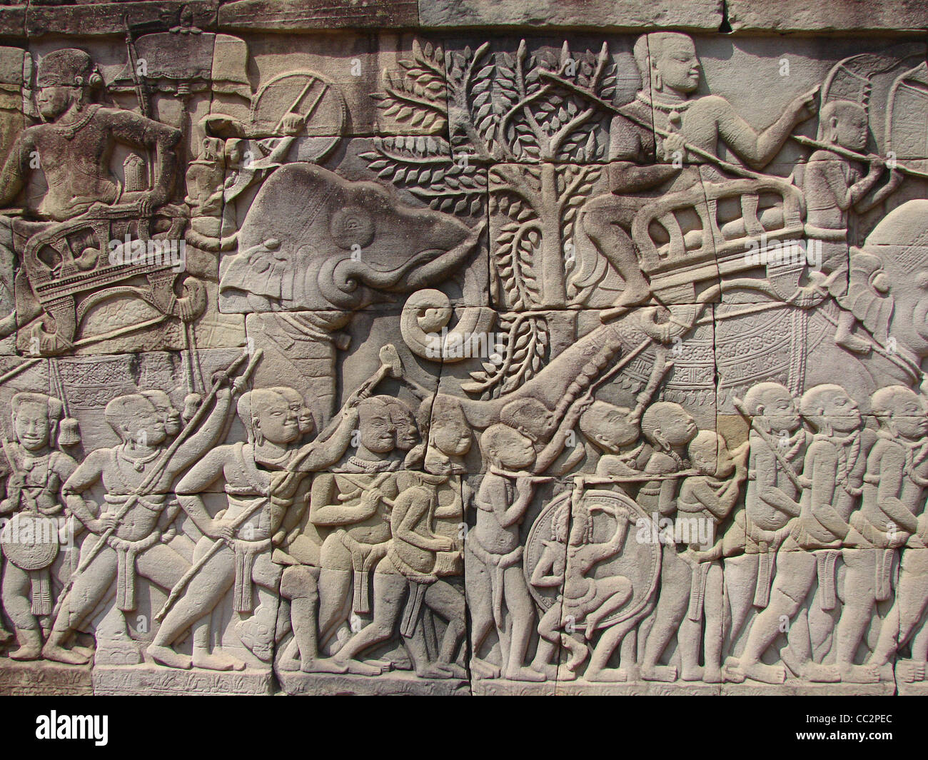 One of the wall carvings of the Angkor Temples in Cambodia. Stock Photo