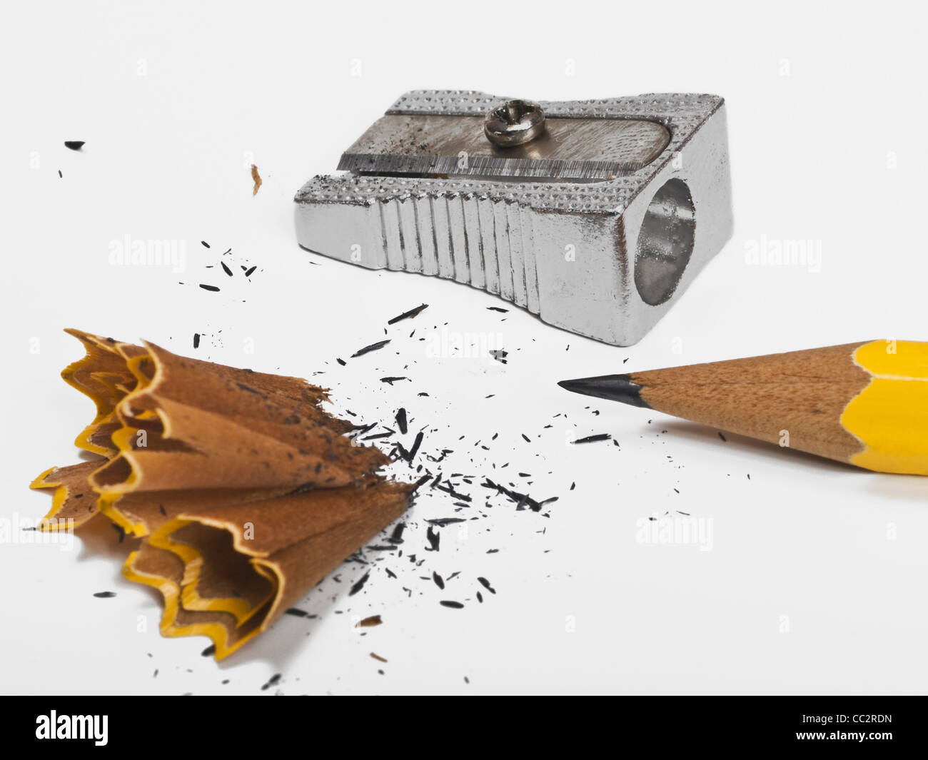 a pencil is sharpened with an sharpener Stock Photo Alamy