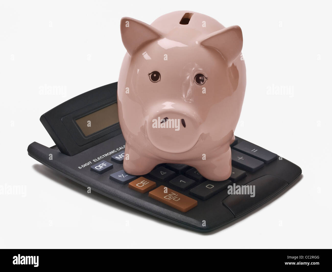 a pocket calculator with a piggy bank on it Stock Photo