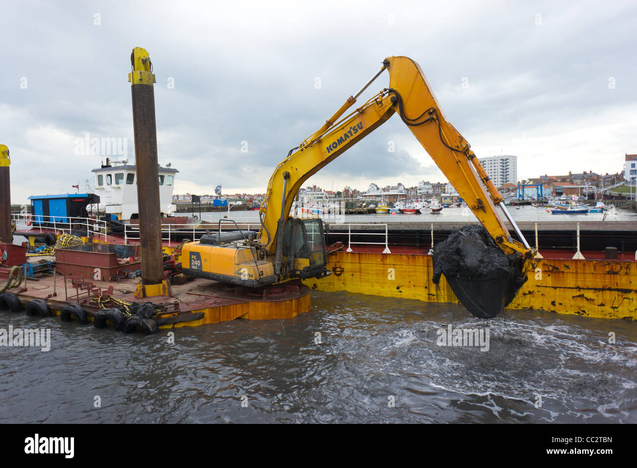 Dredging the harbour in Bridlington North Yorkshire England Stock Photo