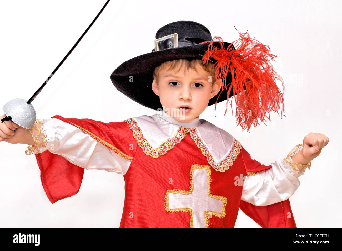 Boy with carnival costume . Little fighting musketeer. Stock Photo